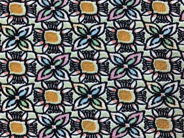 batik arka plan üzerinde güzel renkli çiçekler 