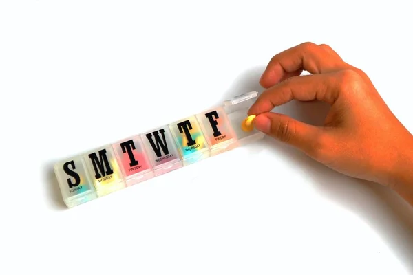 Tıp Organizatör ve beyaz arka plan üzerinde ilacınızı el