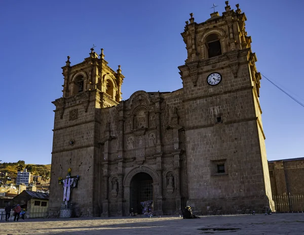 View of the baroque style facade of the Cathedral Basilic San Carlos Borromeo or Puno Cathedral. It is made following the Andean Baroque architectural tradition.