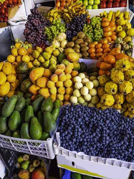 Peruvian food. Shop selling local fruits in boxes collected by countrymen. Cusco city, Peru