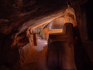 Inca ruins. Underground cave used for ancient Inca ceremonies at Archaeological Park of Qenqo Cusco, Peru clipart