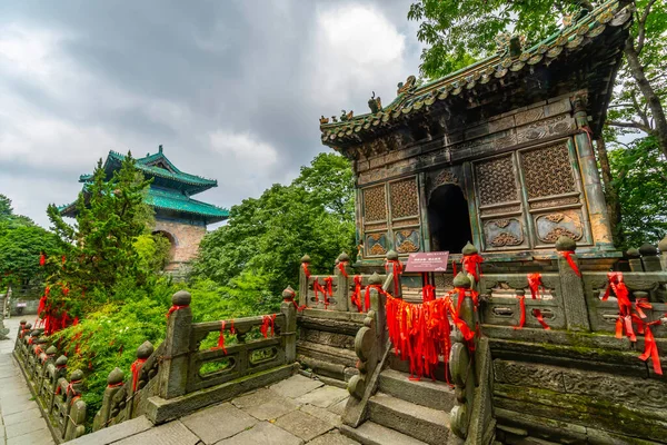 Beautiful and charming ancient architecture in front of Tianmen gate. Small temple and watchtower in Nanyan Palace. Wudang Shan Mountain, China (text: use of precious cultural relics is forbidden)