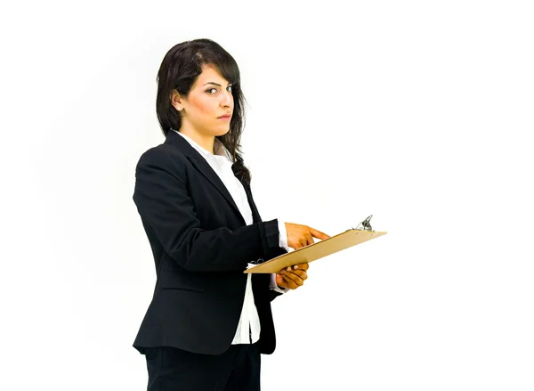 Beautiful businesswoman holding clipboard — Stock Photo, Image