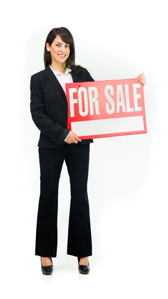 Schöne Geschäftsfrau mit Banner zum Verkauf — Stockfoto