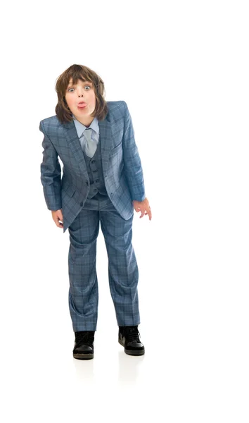 Boy businessman showing tongue — Stock Photo, Image