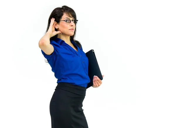 Joven mujer de negocios escuchando secreto — Foto de Stock