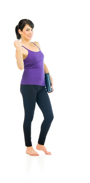 Ganadora fitness mujer mostrando puño — Foto de Stock
