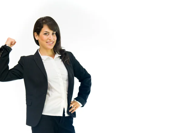 Businesswoman showing strength arm curl — Stock Photo, Image