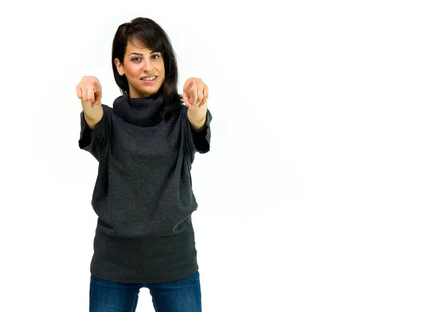 Lässige Frau zeigt mit dem Finger — Stockfoto