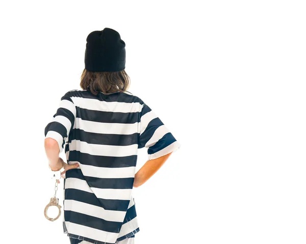 Tiener jongen gevangene terug bekijken — Stockfoto