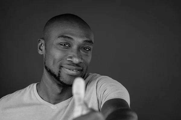 African american man showing thumbs up — Stock Photo, Image