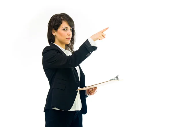 Beautiful businesswoman with clipboard pointing — Stock Photo, Image