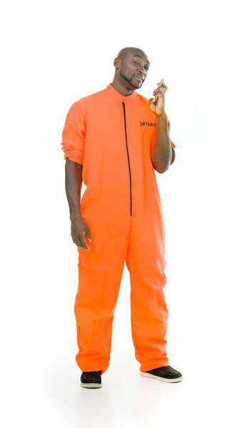 Prisoner man crossed fingers — Stock Photo, Image