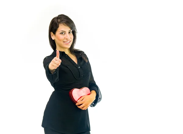 Woman with heart showing thumb up — Stock Photo, Image