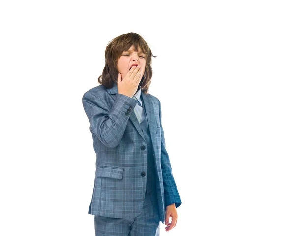 Sleepy, tired, yawning teenage businessman — Stock Photo, Image