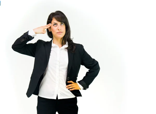 Müde Geschäftsfrau zeigt Kopfschuss-Zeichen — Stockfoto