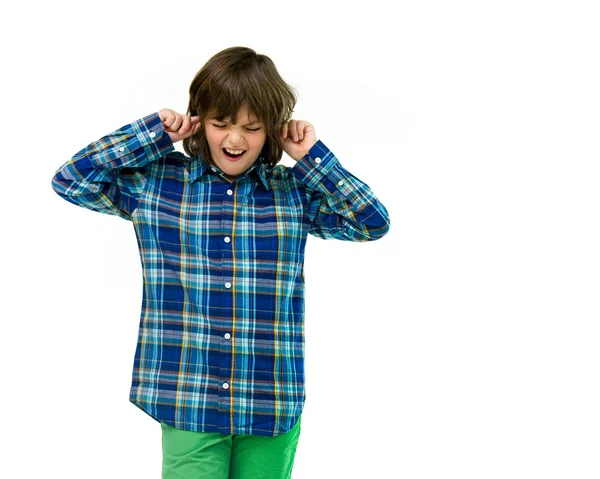 Teenage boy plugging ears — Stock Photo, Image