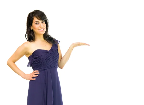 Woman in dress presenting on hand — Stock Photo, Image