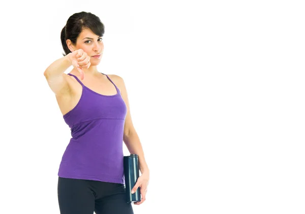 Sport woman showing thumbs down — Stock Photo, Image