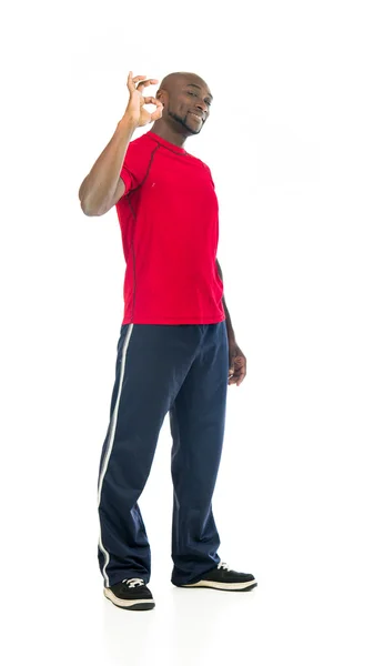 Atleta en forma hombre mostrando signo ok —  Fotos de Stock