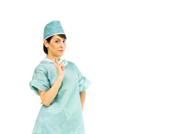 Doctor woman with fingers crossed for luck — Stock Photo, Image