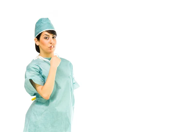 Medico donna mostrando segno di silenzio — Foto Stock