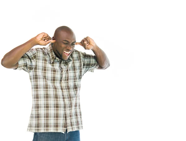 African american man plugging ears — Stock Photo, Image
