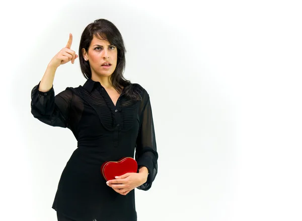 Angry woman with heart scolding — Stock Photo, Image