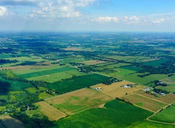 Vista aérea durante o dia das terras agrícolas — Fotografia de Stock