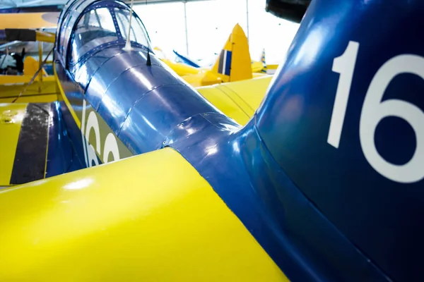 Yellow and blue painted propeller plane — Stock Photo, Image