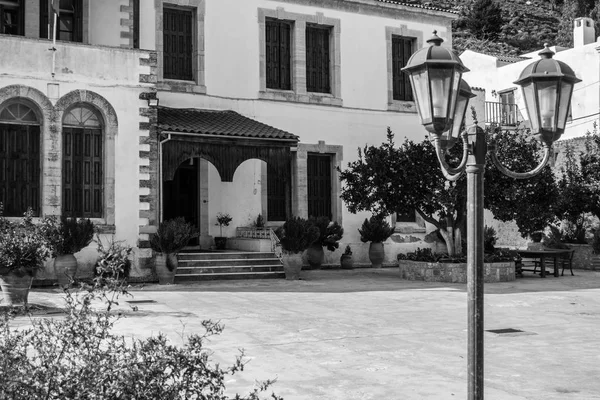 View of streetlight in patio and building exterior, Greece