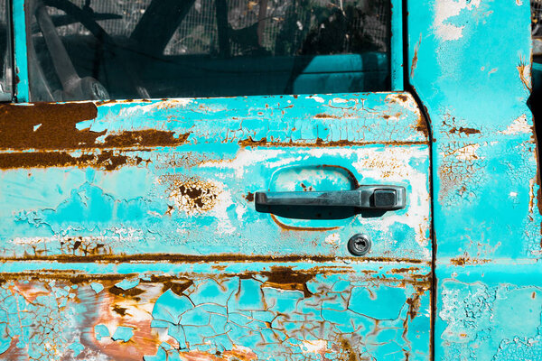 Door handle of rusty car
