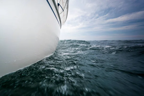 Sailboat cruising on sea, Toronto, Canada