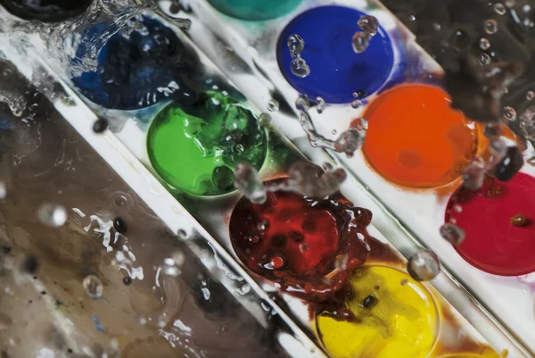 Photo of water splash and color paints — Stock Photo, Image