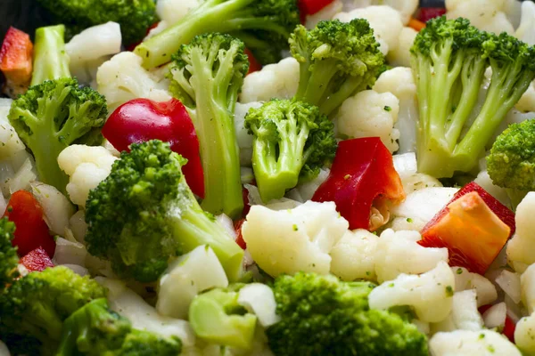 vegetarian food, healthy food. a mixture of vegetables cabbage broccoli cauliflower red bell pepper. fitness, diet, weight loss