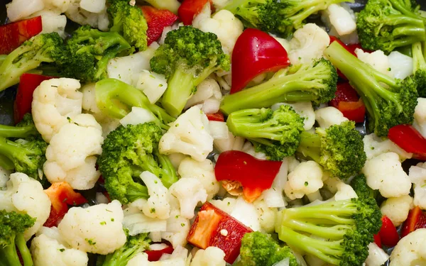 vegetarian food, healthy food. a mixture of vegetables cabbage broccoli cauliflower red bell pepper. fitness, diet, weight loss