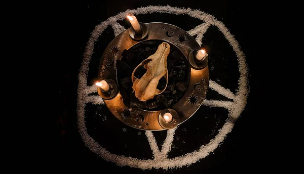 Metaphorical still life of occult symbols