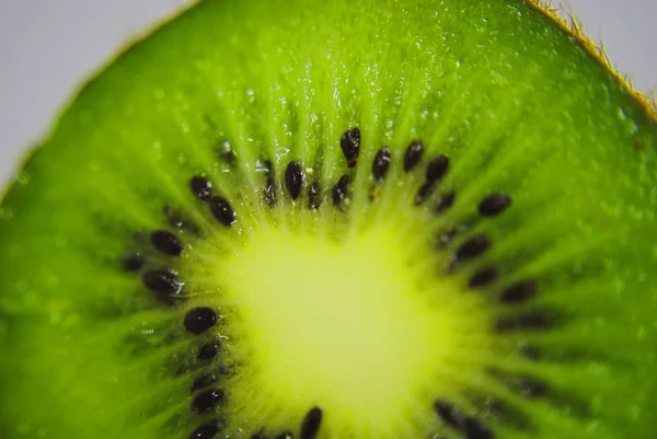 Fresh kiwi on white background, fresh fruit (macro photography)