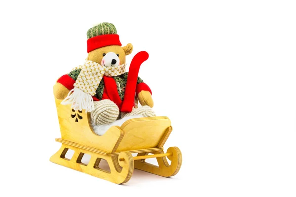 Christmas bear in wooden sleigh on white — Stock Photo, Image