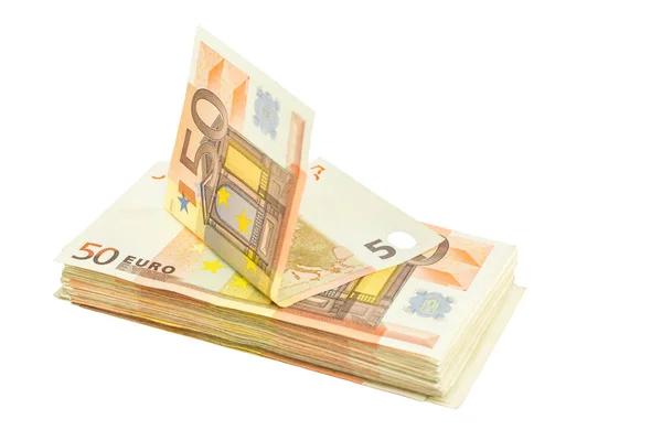 Empilhamento de notas de euro sobre fundo branco — Fotografia de Stock