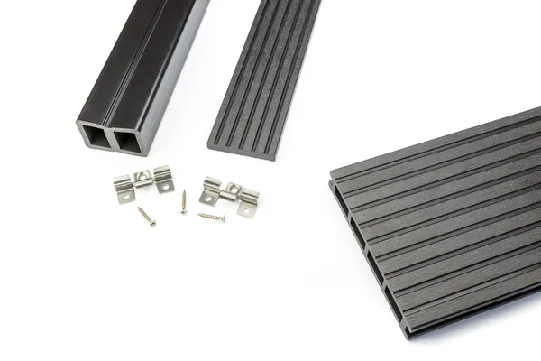 Black composite decking board with mounting material — Stock Image Black composite decking board with mounting material Royalty Free Stock Photos