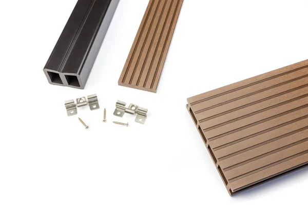 Brown composite decking board with mounting material — Stock Image Brown composite decking board with mounting material Royalty Free Stock Photos