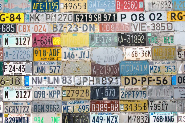 Background filled with various license plates — Stock Photo, Image