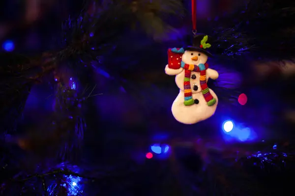 Christmas tree ornament with defocused lights — Stock Photo, Image