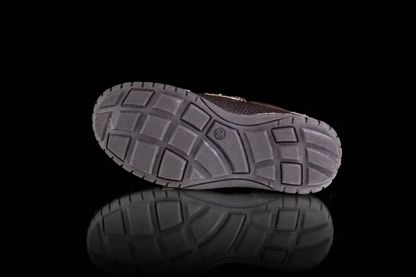 Schuh auf schwarzem Hintergrund, isoliertes Produkt, Draufsicht — Stockfoto