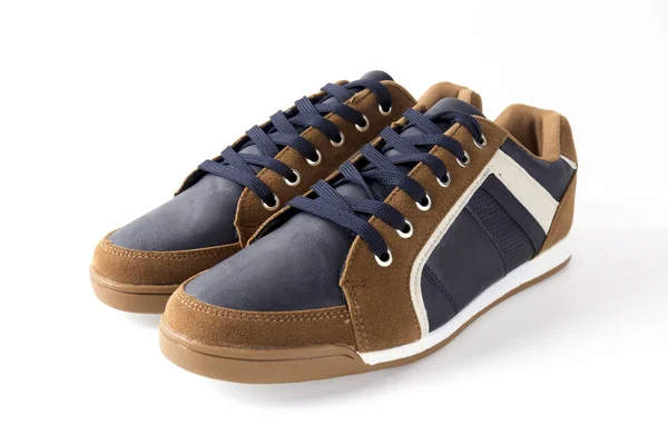 Manlig brun och blå läder Sneaker på vit bakgrund. — Stockfoto