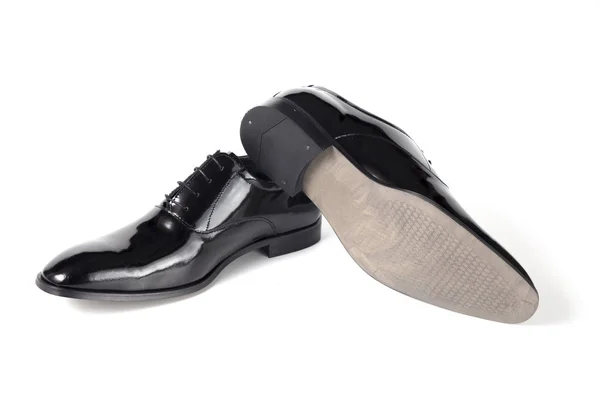 白い背景の上の男性の黒革古典的な靴 — ストック写真