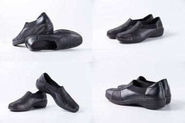 Beyaz arka planda siyah deri kadın ayakkabı