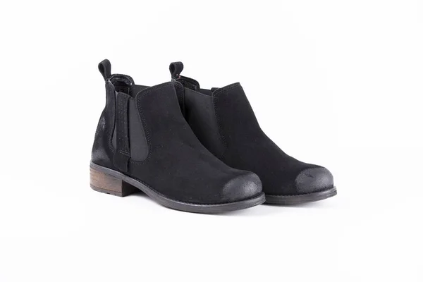 Bota de couro preto feminino no fundo branco — Fotografia de Stock