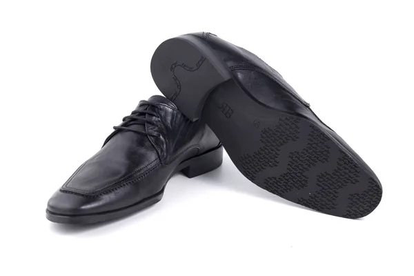 白い背景の上の男性の黒革の靴 — ストック写真